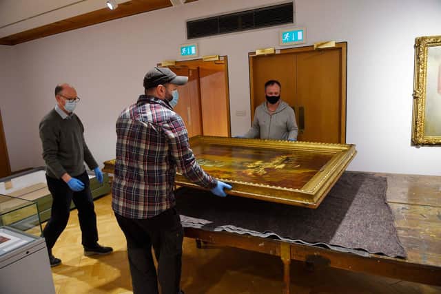 Grandmother’s Birthday by John Henry Lorimer is unpacked at the City Art Centre where it is on loan from the Musee D’Orsay in Paris to be part of the exhibition Reflections: The Light and Life of John Henry Lorimer.
Picture: Greg Macvean