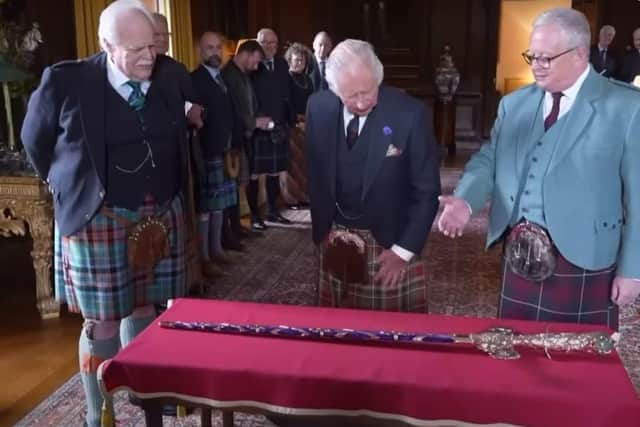 Mark Dennis inspecting the Elizabeth Sword he designed for Charles’ Scottish coronation with the King and Lord Lyon Dr Joe Morrow