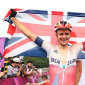 Tom Pidcock celebrates winning the gold medal during the men's cross-country mountain bike race in Izu. Picture: Michael Steele/Getty