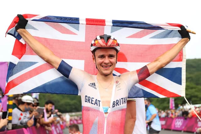 Tom Pidcock celebrates winning the gold medal during the men's cross-country mountain bike race in Izu. Picture: Michael Steele/Getty