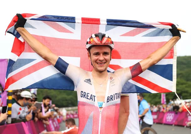 Tom Pidcock celebrates winning the gold medal during the men's cross-country mountain bike race in Izu. Picture: Michael Steele/Getty