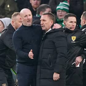 Livingston manager David Martindale (left) embraces Celtic boss Brendan Rodgers after the Scottish Cup clash at Celtic Park.