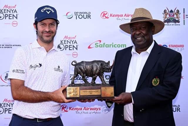 Jorge Campillo is presented with the trophy by The Prime Cabinet Secretary, Hon Musalia Mudavadi, after winning the Magical Kenya Open Presented by Absa at Muthaiga Golf Club in Nairobi. Picture: Stuart Franklin/Getty Images.