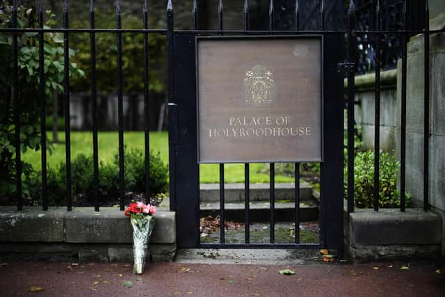 Flowers are laid at the Palace of Holyroodhouse following the death of Queen Elizabeth II. Picture: Christopher Furlong/Getty Images