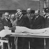 Minister of Health Aneurin Bevan watches a demonstration of a new stretcher on the first day of the new National Health Service in 1948 (Picture: Keystone/Hulton Archive/Getty Images)