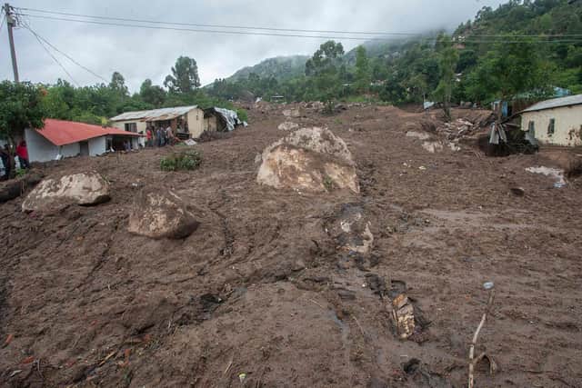 A mudslide triggered by heavy rains brought by Tropical Cyclone Freddy ripped through Manje in Blantyre, southern Malawi on Thursday (Picture: Amos Gumulira/AFP via Getty Images)