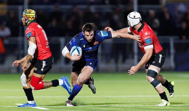 Matt Currie (centre) in action for Edinburgh during the win over the Emirates Lions in the BKT URC at Hive Stadium.  (Photo by Ross Parker / SNS Group)