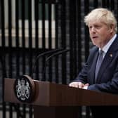 Prime Minister Boris Johnson reads a statement outside 10 Downing Street, London, formally resigning as Conservative Party leader after ministers and MPs made clear his position was untenable. He will remain as Prime Minister until a successor is in place. Picture date: Thursday July 7, 2022.