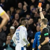 Referee Alan Muir shows St Johnstone's Diallang Jaiyesimi a red card following a VAR check. (Photo by Alan Harvey / SNS Group)
