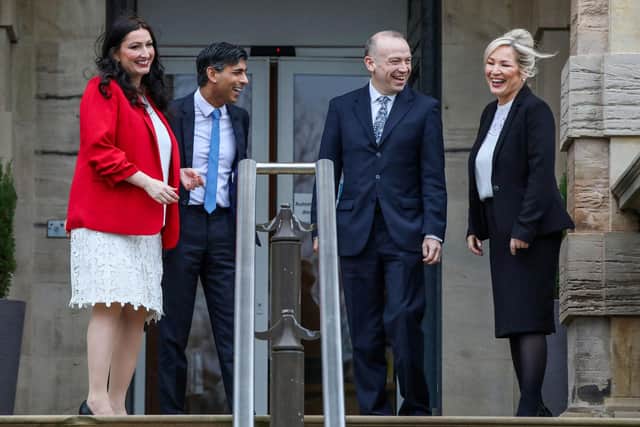 (From left to right) Newly appointed Northern Ireland's deputy first minster, Democratic Unionist Party's Emma Little Pengelly, Prime Minister Rishi Sunak , Britain's Northern Ireland Secretary Chris Heaton-Harris and newly appointed Northern Ireland's First Minster, Sinn Fein's Michelle O'Neill speak together as they leave Stormont Castle. Picture: Paul Faith/AFP via Getty Images