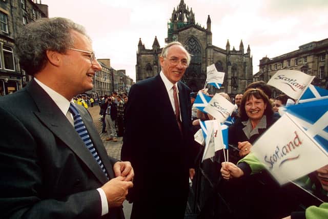 Henry McLeish, left, with the late Donald Dewar on the Royal Mile during the Scottish Parliament inauguration in 1999. Picture: Sutton Hibbert/Shutterstock