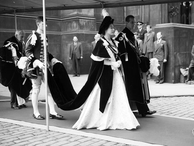 The Queen and Duke walk to the Signet Library from St Giles' Cathedral after a service during the coronation visit in 1953.