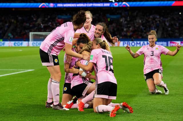 19/06/19 2019 FIFA WOMEN'S WORLD CUP: GROUP D
SCOTLAND v ARGENTINA 
PARC DE PRINCES - PARIS
Erin Cuthbert is mobbed by her teammates after making it 3-0 to Scotland.
