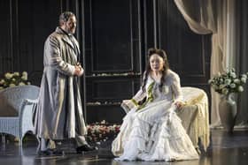 Hye-Youn Lee as Violetta Valéry and Phillip Rhodes as Giorgio Germont in Scottish Opera's production of La traviata. PIC: James Glossop