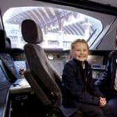 LNER driver Becky Brown and her daughter Maisie in a train cab. PIcture: Nigel Roddis/PA Wire