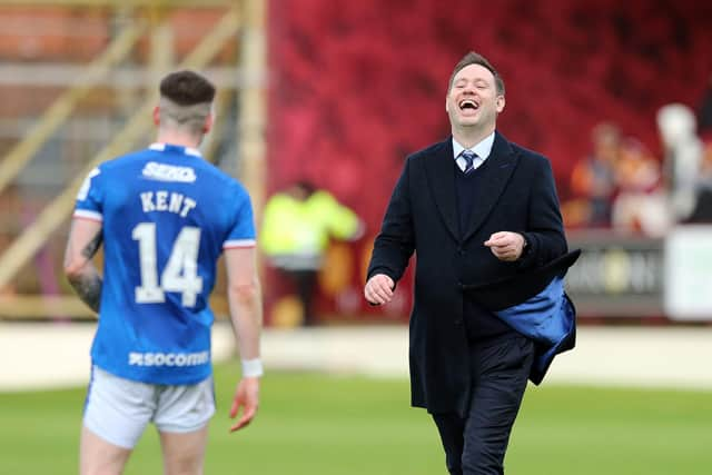 Rangers manager Michael Beale shares a laugh with Ryan Kent after the final whistle at Motherwell.