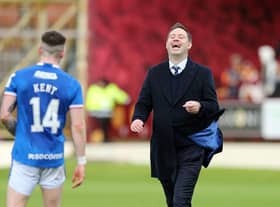 Rangers manager Michael Beale shares a laugh with Ryan Kent after the final whistle at Motherwell.
