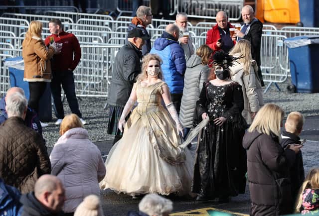 Two Scotland fans attend BT Murrayfield in fancy dress.
