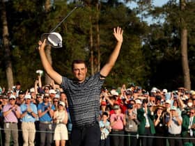 Scottie Scheffler celebrates on the 18th green after winning the 86th Masters at Augusta National Golf Club. Picture: Jamie Squire/Getty Images.