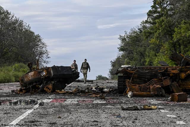 Destroyed armoured vehicles litter the road in Balakliya, Kharkiv region, on Saturday, after Ukrainian troops drove out Russian forces from the area (Picture: Juan Barreto/AFP via Getty Images)