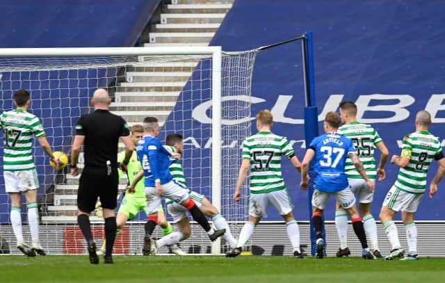 Jonjoe Kenny puts the ball into his own net under pressure from Ryan Kent for Rangers' second goal in the Scottish Cup tie at Ibrox. (Photo by Rob Casey / SNS Group)