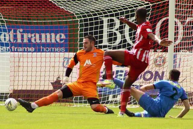Julian Wade scores the opener against Strathspey (Photo: Ian Rennie)
