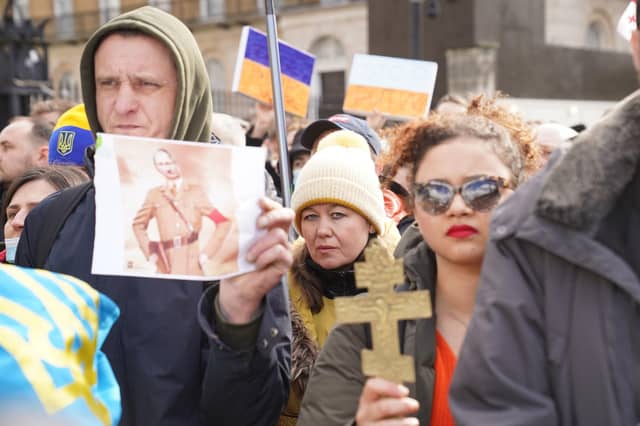 Ukrainians hold a protest against the Russian invasion of Ukraine outside Downing Street