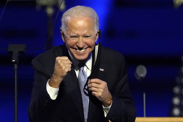 President-elect Joe Biden celebrates victory after it became clear he had won enough electoral college votes (Picture: Andrew Harnik/AP)