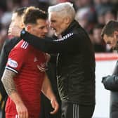 Aberdeen boss Jim Goodwin and winger Matty Kennedy.  (Photo by Mark Scates / SNS Group)