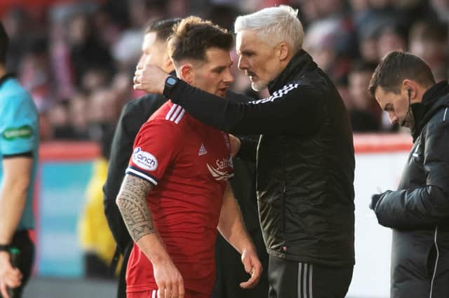Aberdeen boss Jim Goodwin and winger Matty Kennedy.  (Photo by Mark Scates / SNS Group)