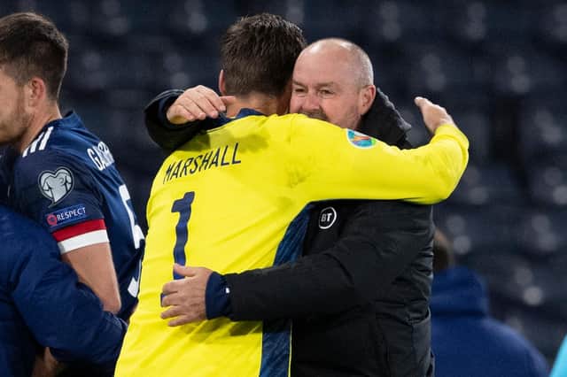 Goalkeeper David Marshall (L) is congratulated by his manager Steve Clarke following Scotland's vctory during the Euro 2020 Play off match against Israel at Hampden. (Photo by Alan Harvey / SNS Group)