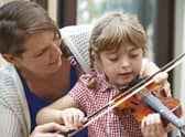 Most younger children in Midlothian would no longer have access to any musical instrument tuition under the proposals put forward by the council.
