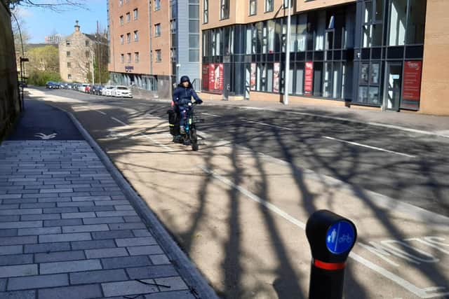 A new stretch of segregated cycle lane in Old Dumbarton Road near the Kelvin Hall in Glasgow. Picture: The Scotsman