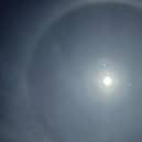 Photo of a halo around the moon above houses in Staffordshire (Pic: Ben Light/PA Wire)