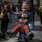 Tourists on Edinburgh' Royal Mile as the Festival Fringe entered its final weekend in August 2024 (Picture: Jeff J Mitchell/Getty Images)