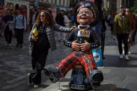 Tourists on Edinburgh' Royal Mile as the Festival Fringe entered its final weekend in August 2024 (Picture: Jeff J Mitchell/Getty Images)