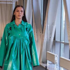 Lorna Gibson has created a unique dress using fabric exclusively from excess material from Globus’ PPE manufacturing process for her final year university project.