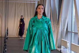 Lorna Gibson has created a unique dress using fabric exclusively from excess material from Globus’ PPE manufacturing process for her final year university project.