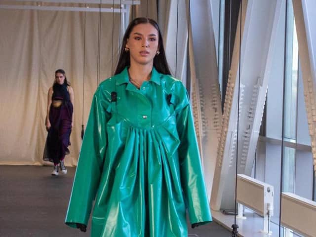Lorna Gibson has created a unique dress using fabric exclusively from excess material from Globus’ PPE manufacturing process for her final year university project.