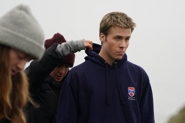 Actor Ed McVey, who plays the part of Prince William, on set in between filming scenes at the harbour for the next season of The Crown in St Andrews