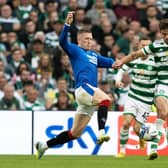 John Lundstram and Matt O'Riley in action during a cinch Premiersip match between Celtic and Rangers at Celtic Park, on September 03, 2022, in Glasgow, Scotland.  (Photo by Alan Harvey / SNS Group)