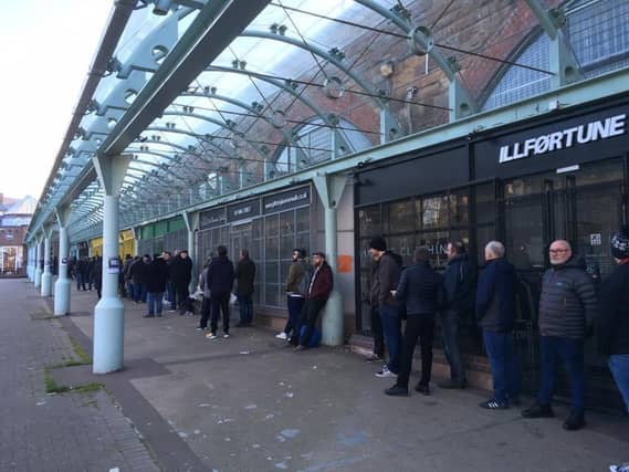 Record buyers queue outside Monorail Music, in Glasgow, for Record Store Day.