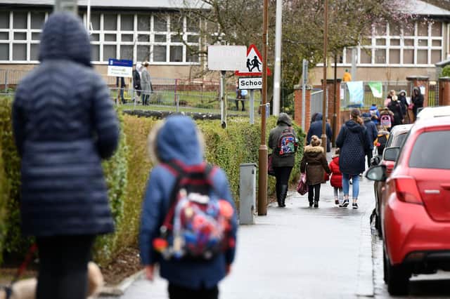 Pupils walking to school in Falkirk in March. Picture Michael Gillen.