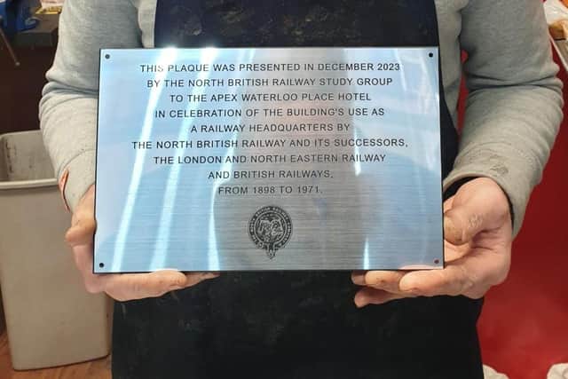 Niall Menzies of Roseburn Shoe Repairs who supplied the plaque