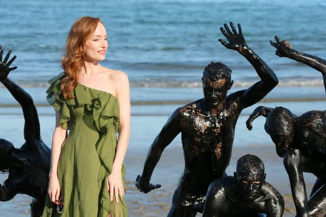 VENICE, ITALY - SEPTEMBER 03: Lotte Verbeek and the cast of "The Book Of Vision" recreate the pinnacle scene from the movie during  the 77th Venice Film Festival at  on September 03, 2020 in Venice, Italy. (Photo by Ernesto S. Ruscio/Getty Images)