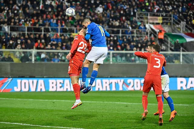 New Aberdeen signing Bojan Miovski, pictured in action for Macedonia up against Italy's defender Gianluca Mancini.