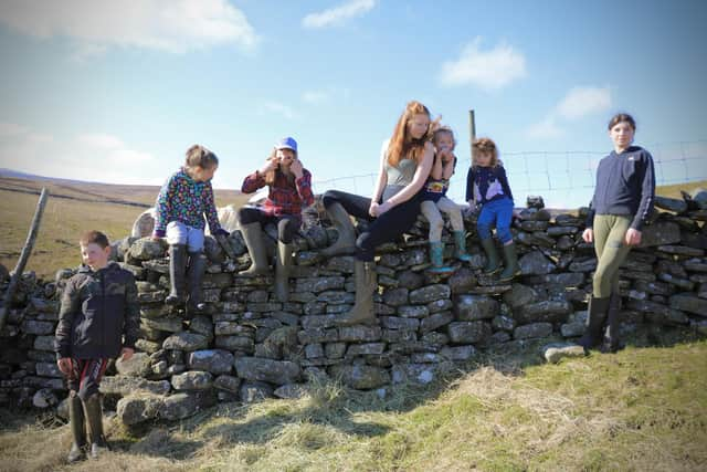 Seven of the Owen's nine children, at Ravenseat Farm, Yorkshire.