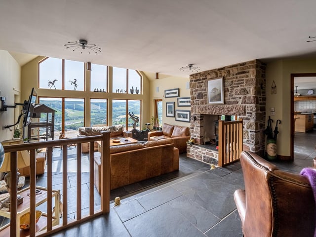 Interior: The house has five bedrooms and a large sitting room, open-plan kitchen-dining space, an office, and a large first-floor mezzanine with spectacular views. The cottage has three bedrooms, features a formal lounge and cosy family snug, and would make an ideal holiday let.