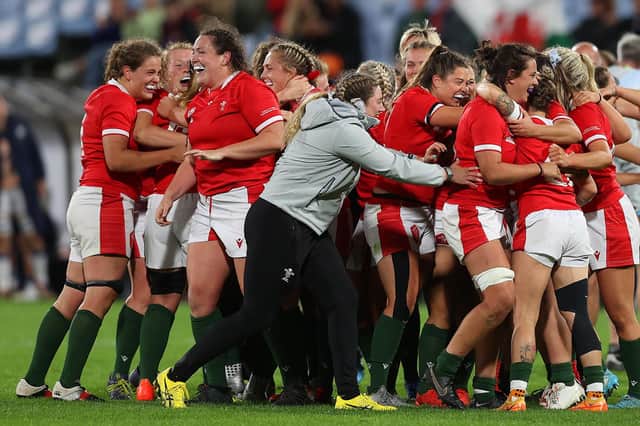 Wales celebrate their last-ditch Pool A win over Scotland at the World Cup.