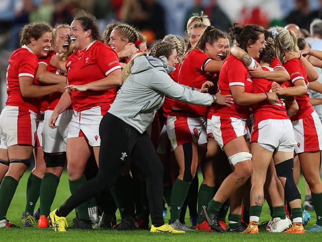 Wales celebrate their last-ditch Pool A win over Scotland at the World Cup.